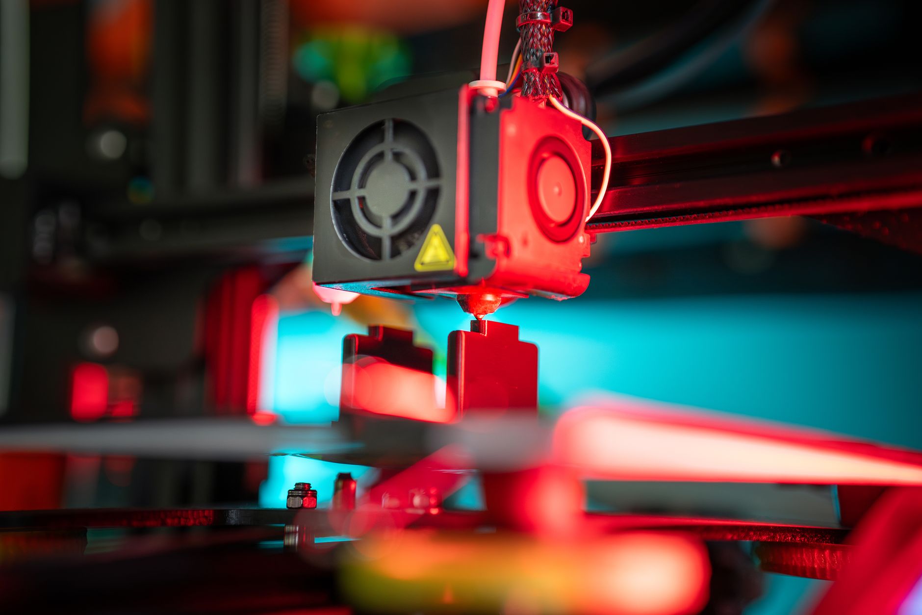 A vibrant close-up of a 3D printer in action creating a prototype. — How to Get More Positive Google Reviews for Your Local B