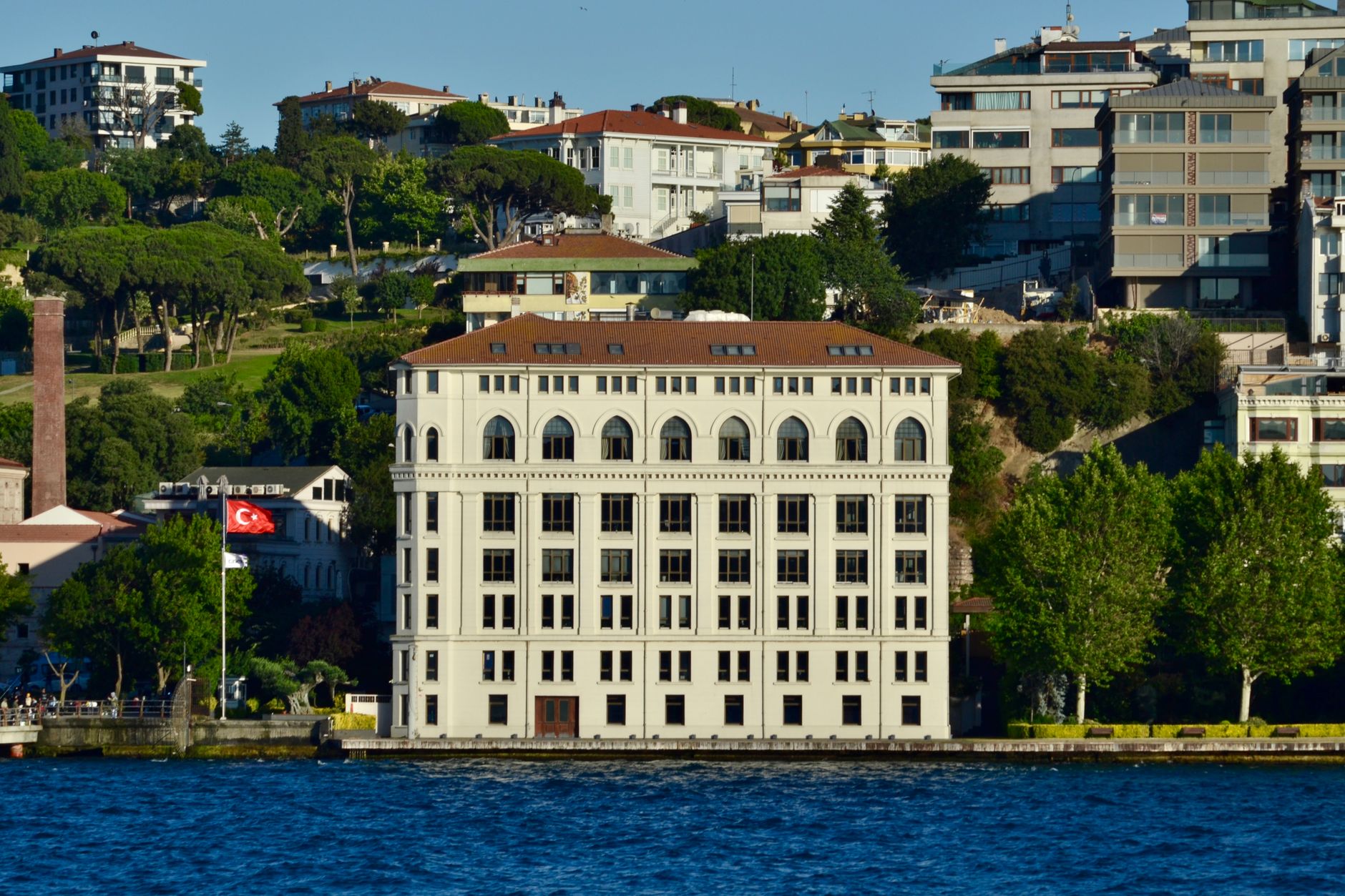 Elegant seaside building in Istanbul near Bosphorus, showcasing classic architecture. — Mastering Music Services By Music Pro